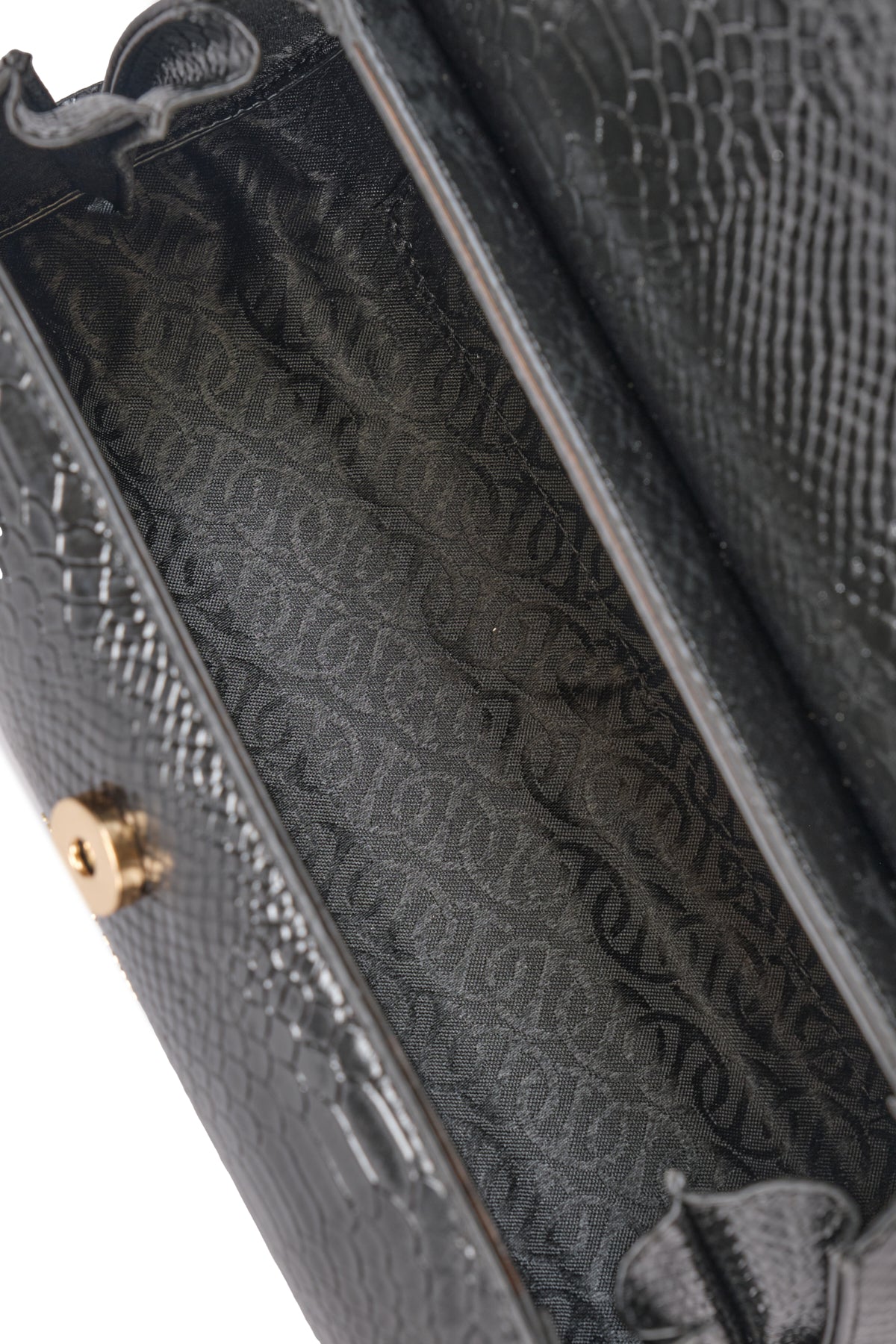 Çantë dore e harkuar me reliev krokodili