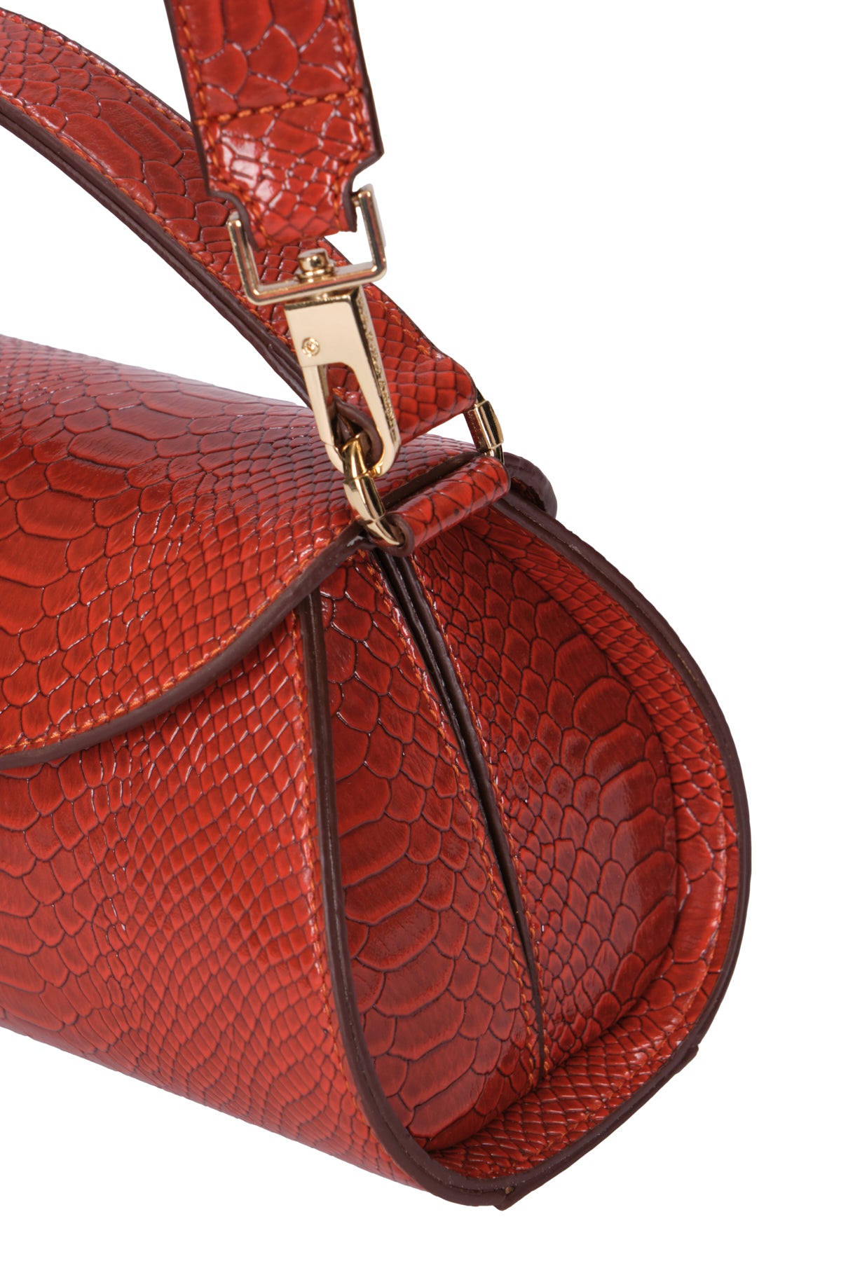 Çantë dore e harkuar me reliev krokodili