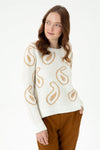 Sweater with curved motifs