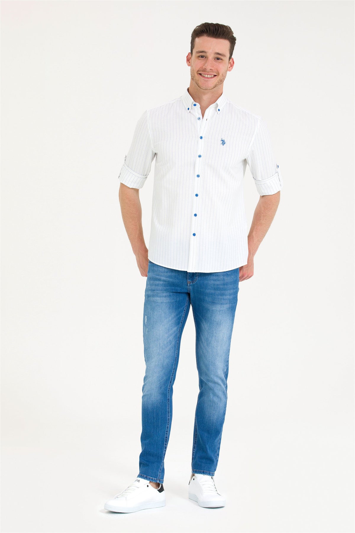 Xhinse të ngushta me xhep trikolor