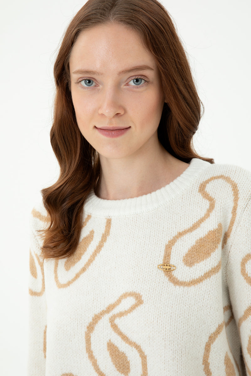 Sweater with curved motifs