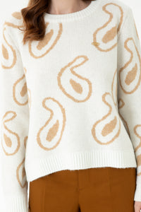 Sweater with curved motifs